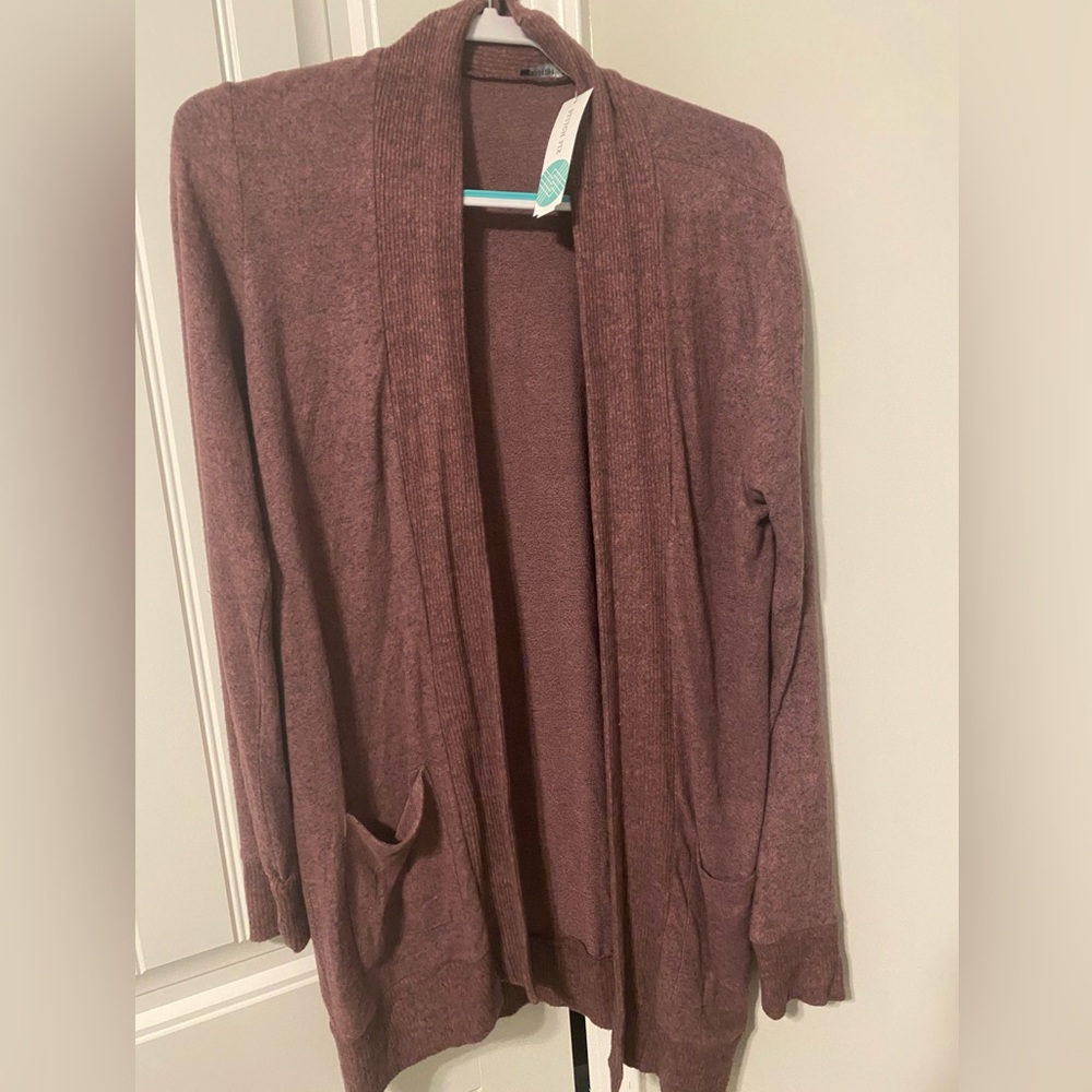 Dark pink/purple cardigan. Brand new with tags.
